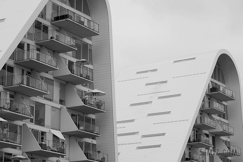 灰白建筑现代创意弧面设计的房子建筑设计背景图片