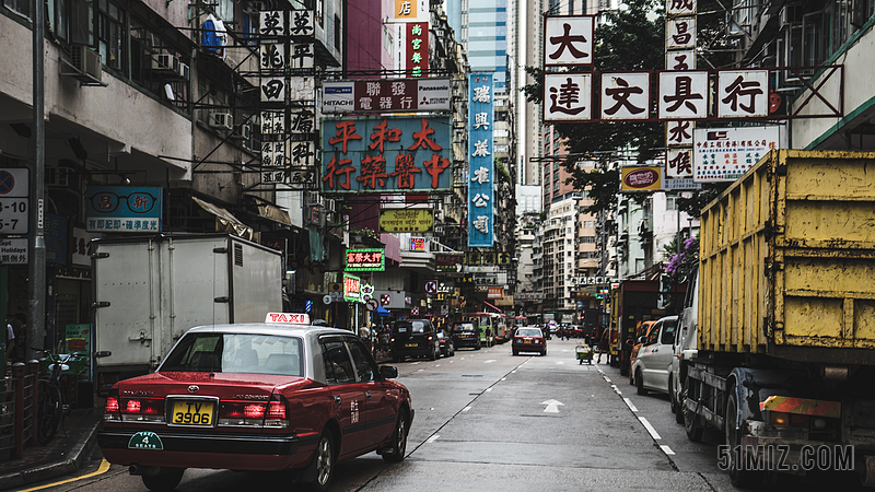 灰色建筑景观现代复古香港城市拥挤的街道路旁景观照背景图片